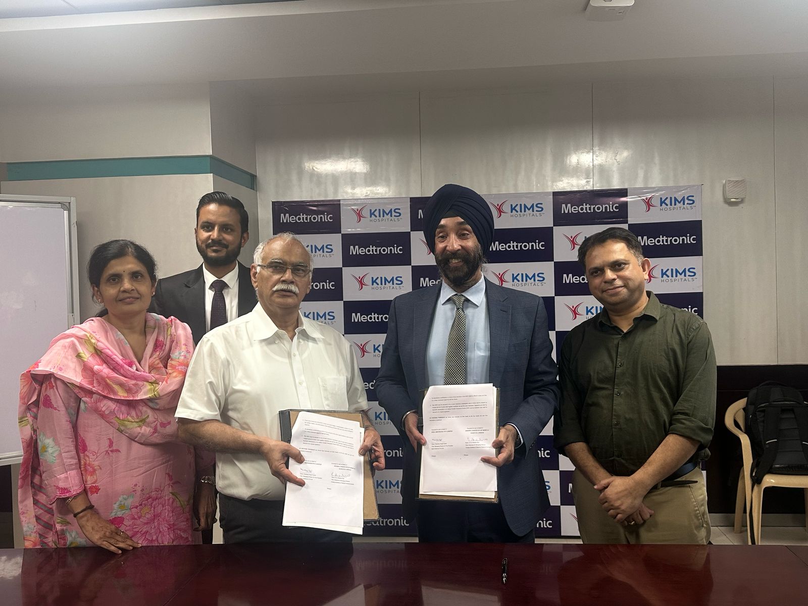 mou signing kims group surgical image