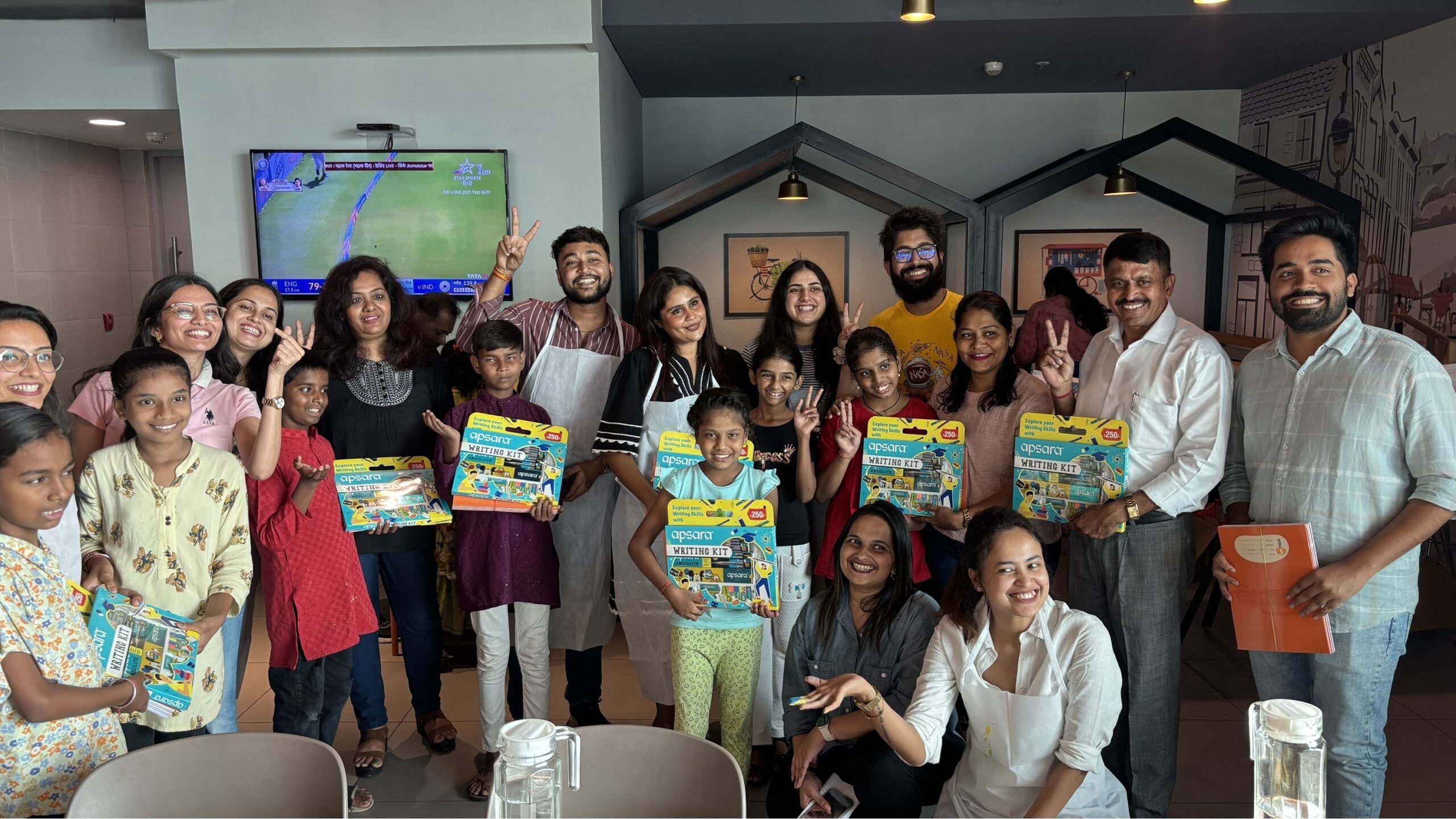 Time Off, Big Impact: K Raheja Corp's Purpose-Driven Volunteering Initiative Supports Underprivileged Students 1 Employees of K Raheja Corp with students at the Back to School campaign scaled